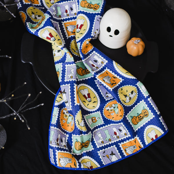 Ghosties on Stamps Waffle Knit Tea Towel
