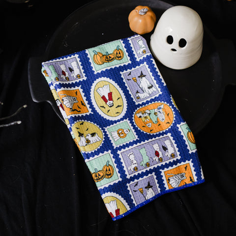 Ghosties on Stamps Waffle Knit Tea Towel