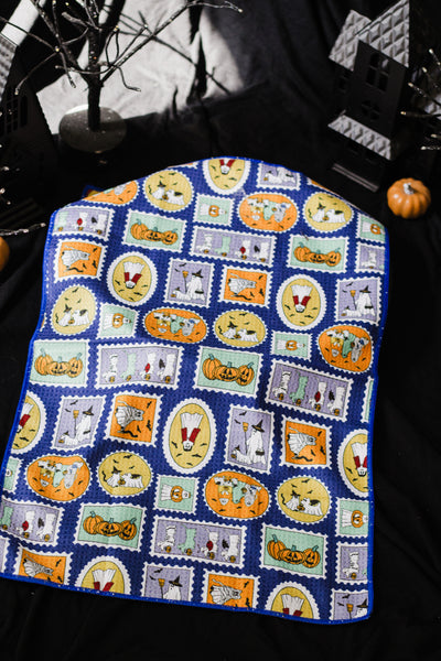 Ghosties on Stamps Waffle Knit Tea Towel