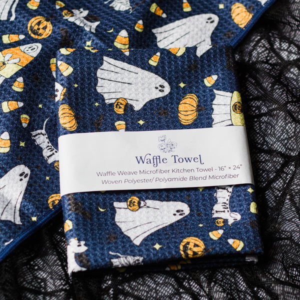 Ghosties on Navy Background 2026 Tea Towel